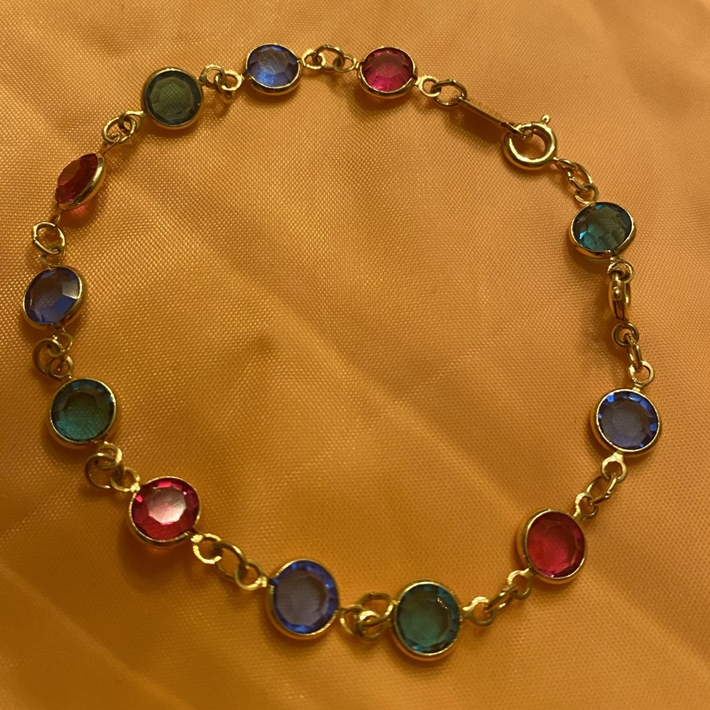SWAROVSKI Swan Signed Multi Color Crystal Benzel Set Gold Tone Bracelet